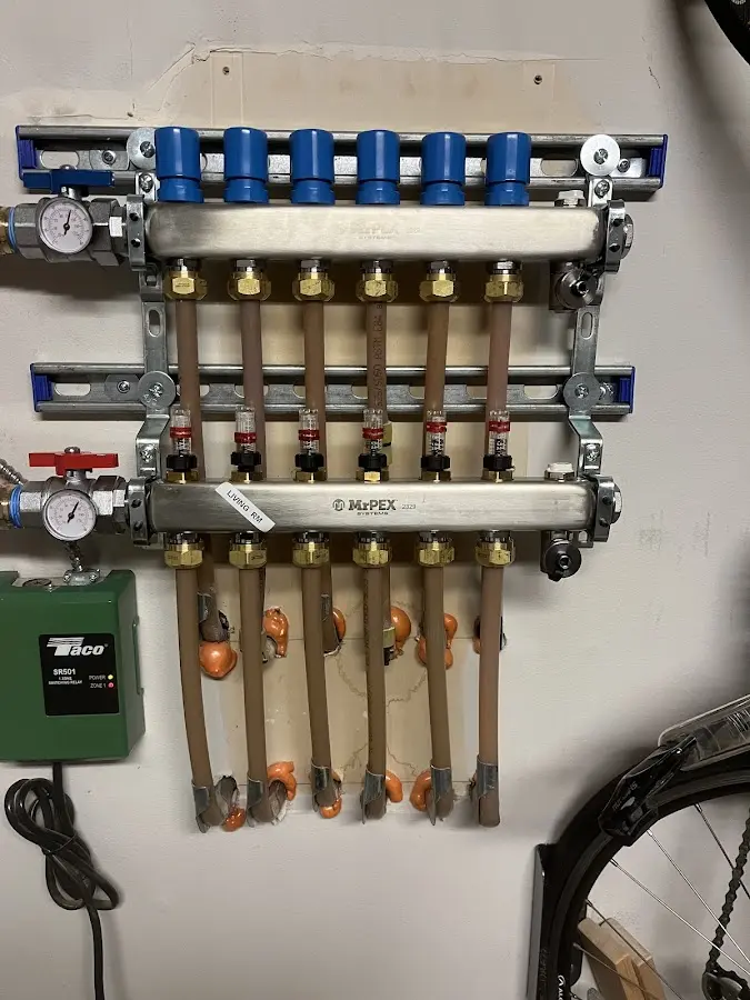 Plumber performing Gas Line Installation at a residential property in Lake City